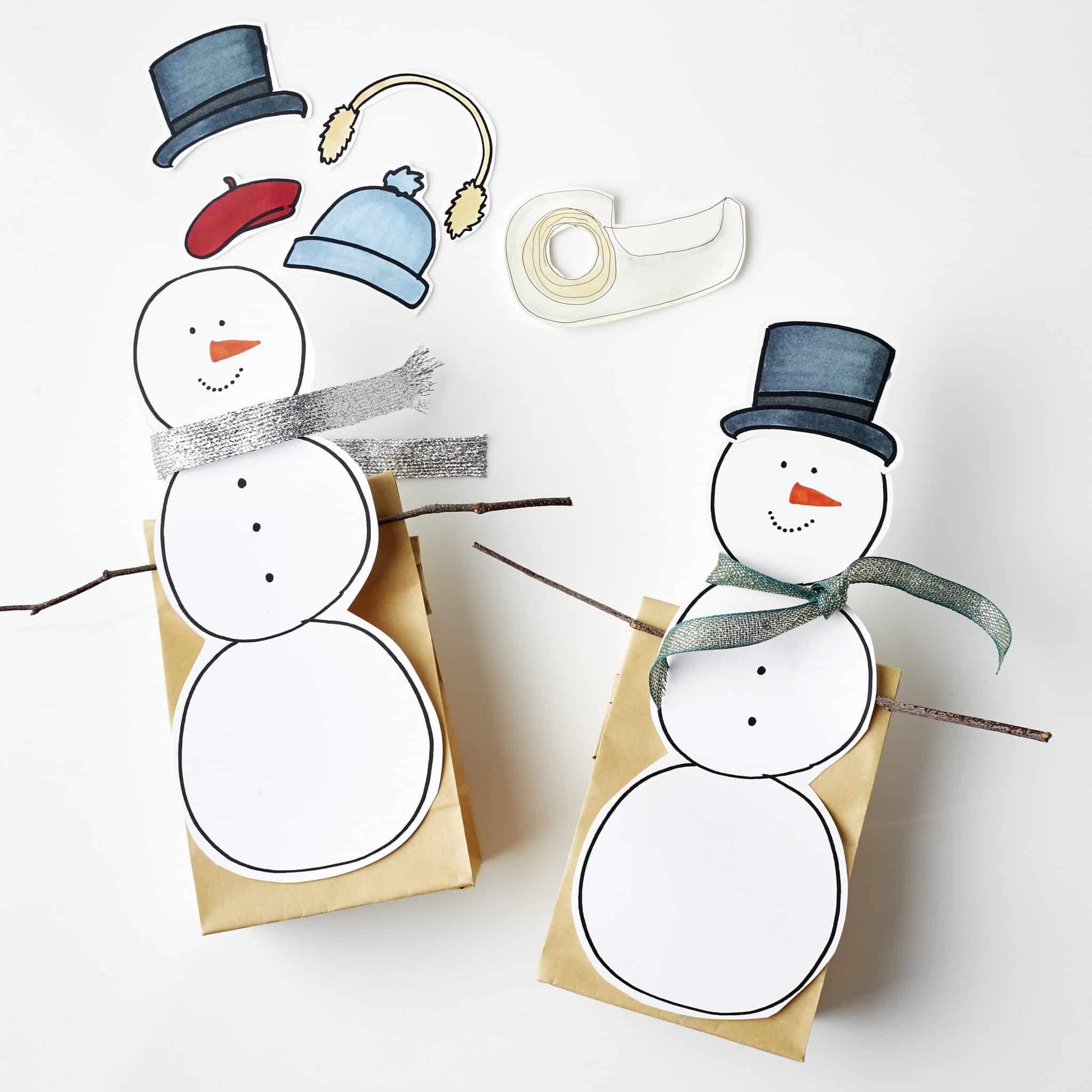 Use double-sided tape deck out your snowmen in paper accessories . 